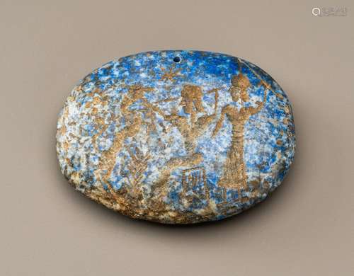 A BACTRIAN LAPIS LAZULI INTAGLIO TALISMAN WITH HUNTING SCENE