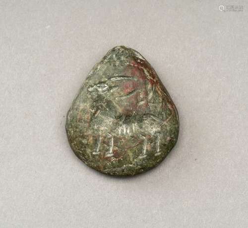 A BACTRIAN SERPENTINE INTAGLIO TALISMAN WITH AN ANTELOPE