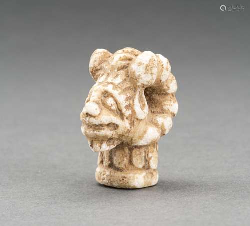 A SMALL BACTRIAN STONE CARVING OF A 'GOAT DEITY HEAD'