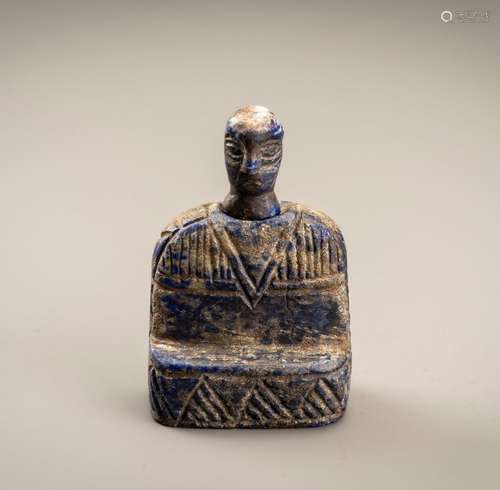 A BACTRIAN STYLE LAPIS LAZULI SEATED FEMALE FIGURE