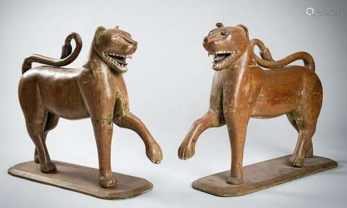 A LARGE AND RARE PAIR OF WOODEN WILDCATS, MUGHAL EMPIRE