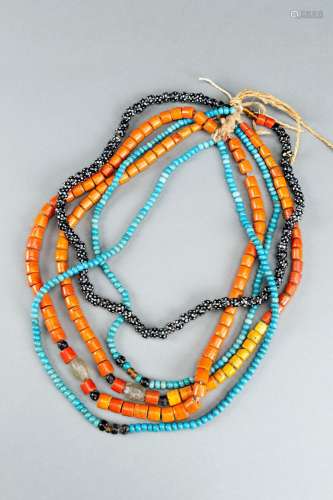 FIVE NAGALAND MULTI-COLORED GLASS NECKLACES STRUNG TOGETHER,...