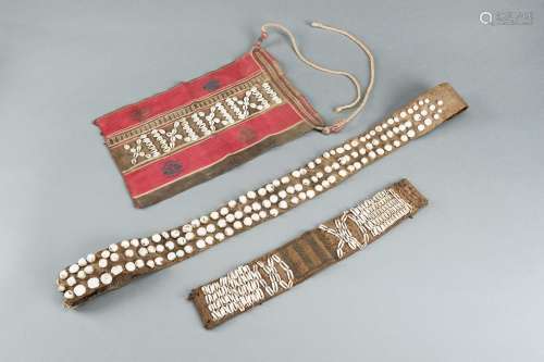 LOT WITH TWO TRIBAL NAGALAND SHELL STUDDED BELTS AND AN APRO...