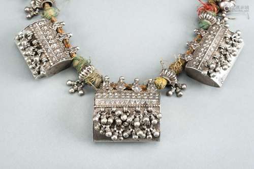 A FINE SILVER AMULET NECKLACE, c 1920s