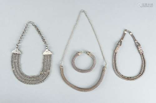 THREE SILVER NECKLACES AND A SILVER BRACELET, c. 1900s