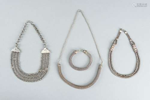 THREE SILVER NECKLACES AND A SILVER BRACELET, c. 1900s