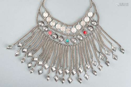 A TRIBAL AFGHAN MULTI-STRAND SILVER NECKLACE WITH GLASS INSE...