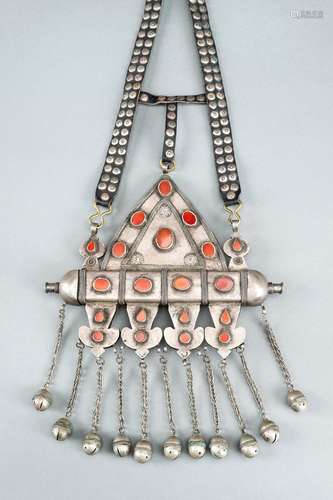 A TURKOMAN SILVER AND CARNELIAN AMULET HOLDER, c. 1900s