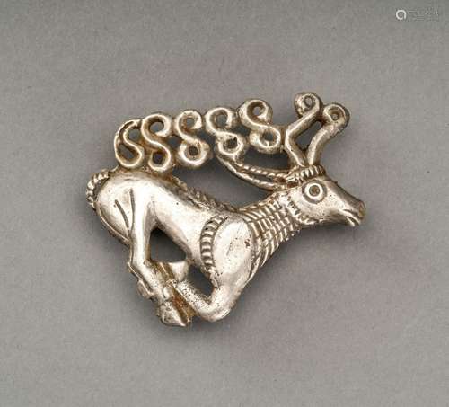 AN ANCIENT SILVER PLAQUE IN THE SHAPE OF A STAG