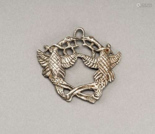 A WESTERN ASIATIC STYLE OPENWORK SILVER PENDANT WITH BIRDS