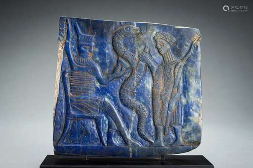 A LAPIS LAZULI FRIEZE OF A DIGNITARY WITH SNAKE