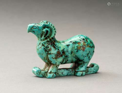 A TURQUOISE CARVING OF A RAM