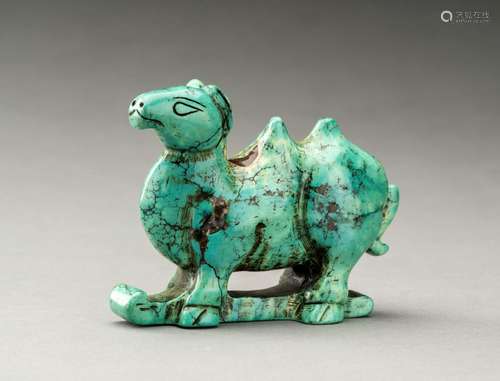 A TURQUOISE CARVING OF A CAMEL