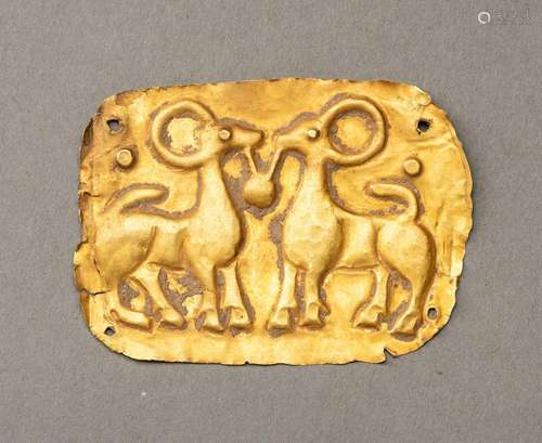 A WESTERN ASIATIC SHEET GOLD REPOUSSÉ PLAQUE WITH RAMS