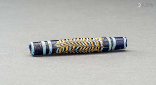 A MULTICOLORED SASANIAN ISLAMIC GLASS BEAD