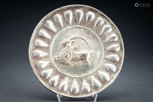 A PERSIAN SILVER REPOUSSÉ ‘ANTELOPE’ DISH