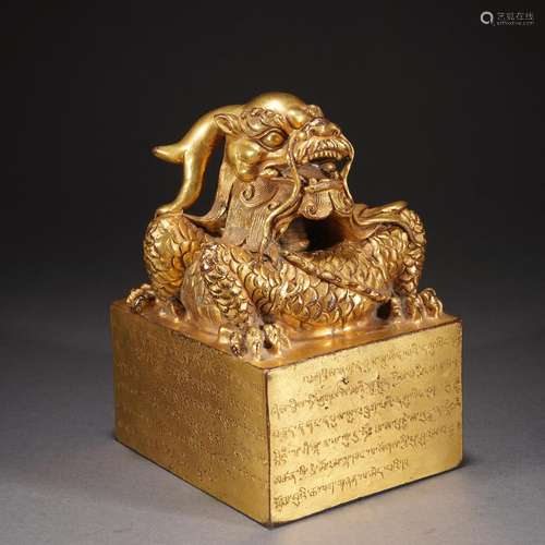 A TIBETAN GILT BRONZE DRAGON SEAL