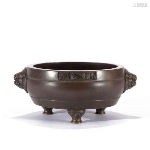 A BRONZE TRIPOD CENSER