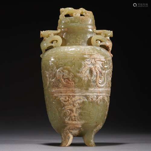 A YELLOW JADE CARVED DRAGON VIEWS VASE