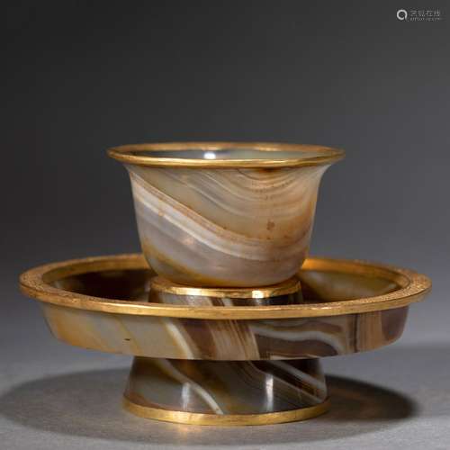 A SET OF AGATE CUP AND SAUCER