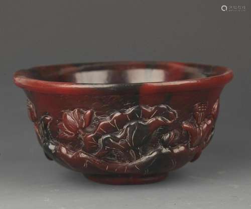 A FINELY CARVED CUP