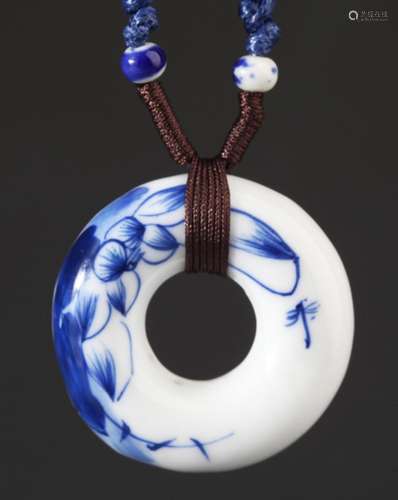 A PORCELAIN PENDANT