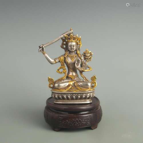 A FINELY MADE BRONZE GILT AND GOLD-PLATED STATUE OF MANJUSHR...