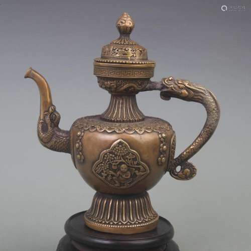 A FINE CHARACTER CARVING DRAGON HANDLE BRONZE EWER
