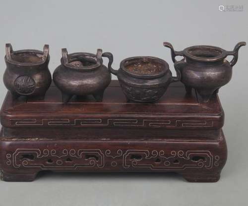 GROUP OF FOUR BRONZE CENSER