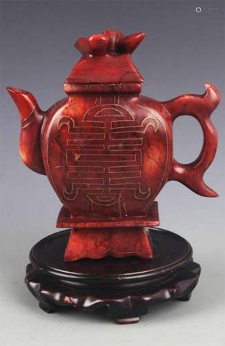 A FINELY CARVED EWER WITH GOLD-PAINTED LONGEVITY CHARACTER P...