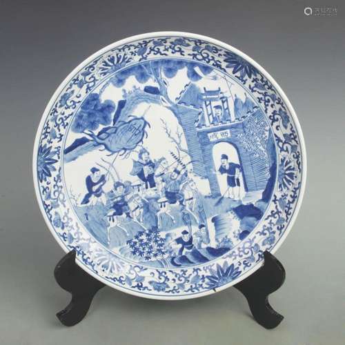 A BLUE AND WHITE CHARACTER PATTERN PLATE