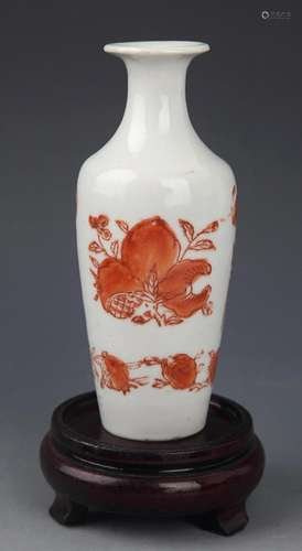 VASE WITH ALUM RED GLAZE AND FLORAL DESIGN