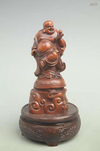 HUANGYANG WOOD FIGURINE OF MAITREYA BUDDHA WITH A LARGE BELL...