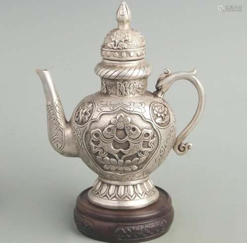 A FINE FISH PATTERN WHITE BRONZE EWER