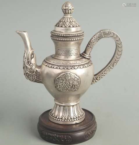 A FINE WHITE BRONZE FINELY CARVED EWER