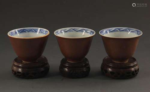 GROUP OF THREE DARK COLOR GLAZED PORCELAIN CUP