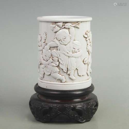 CARVED PORCELAIN BRUSH HOLDER WITH DEPICTION OF CHILDREN PLA...