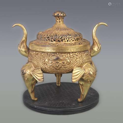 A FINE BRONZE GILDED INCENSE BURNER WITH ELEPHANT FEET PATTE...