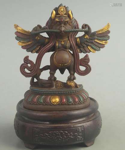 A FINE COLORED GLASS MADE TIBETAN BUDDHIST GARUDA BIRD