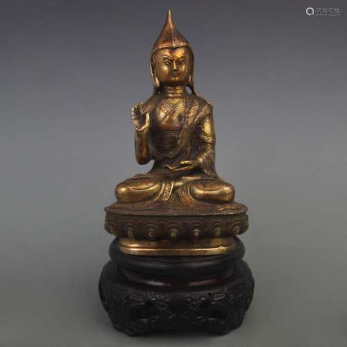 A BRONZE TIBETAN BUDDHIST GELUGPA SECT BUDDHA STATUE