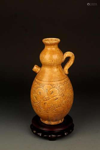 A YELLOW-GLAZED CARVED GOURD-SHAPED WATER JAR