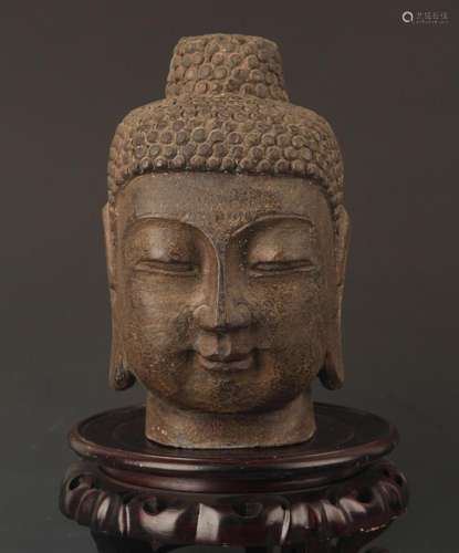 A FINELY CARVED STONE BUDDHA HEAD