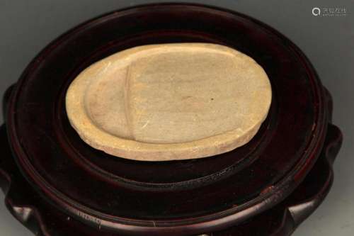 A FINE SMALL POTTERY INKSTONE