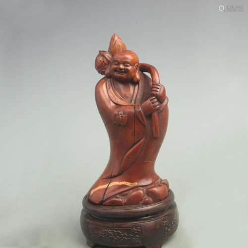 A FINE BOXWOOD MADE MALE BAG MONK FIGURE