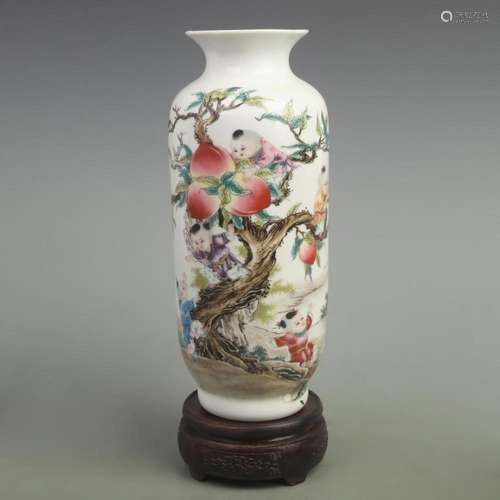 A FAMILLE ROSE CYLINDRICAL VASE WITH \"NINE SONS CLIMBI...