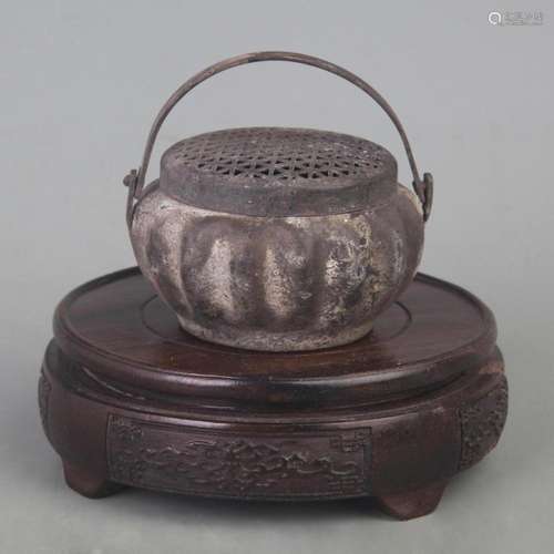 A FINE HOLLOW CARVING BRONZE INCENSE BURNER