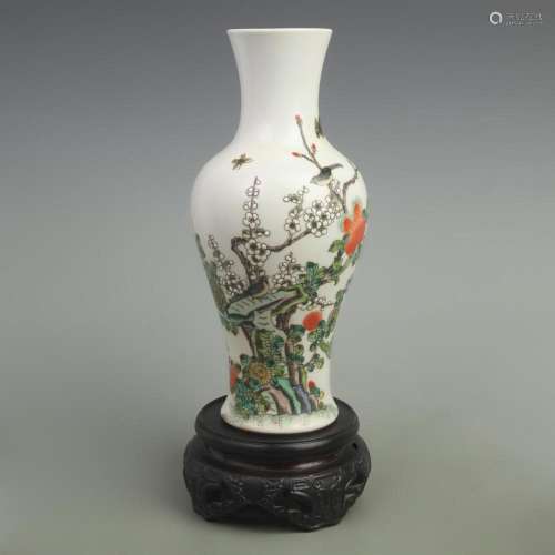 PORCELAIN VASE WITH MAGPIES PERCHED ON PLUM BLOSSOMS