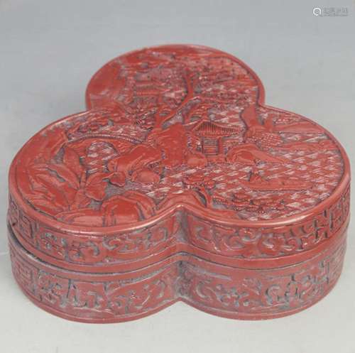 A CARVED RED LACQUER BOX FEATURING A SCENIC LANDSCAPE WITH B...