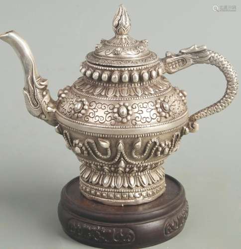 A FINE BRONZE TEAPOT WITH TREASURE BEAD AND CHAIN PATTERN