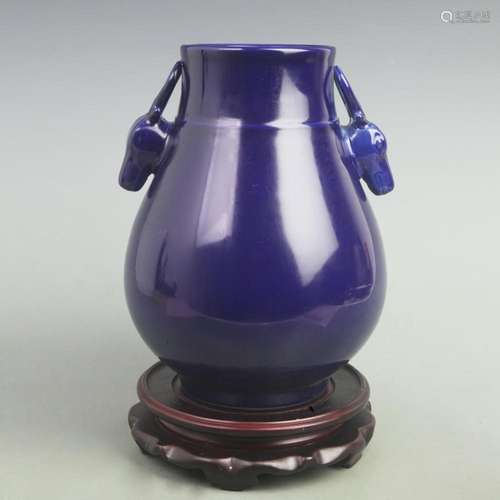 A DARK BLUE GLAZED DEER HEAD STYLE PORCELAIN VASE